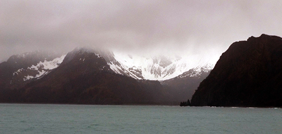 Kenai-Fjords-National-Park-boat-tour-mountain-view
